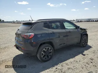 2018 Jeep Compass Trailhawk with VIN 3C4NJDDBXJT484835, listed as a Copart auction lot 61542415 with 59,389 mi miles and Salvage title. Bid and sale history available at DreamBid. Image 3.