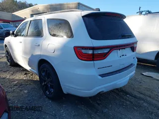 2023 Dodge Durango R/T Plus z VIN 1C4SDHCTXPC567522, wystawiony jako IAAI lot #41339712 z przebiegiem 55 386 mil mil oraz . Historia ofert i sprzedaży dostępna na DreamBid. Obrazek 3.