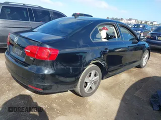 2012 Volkswagen Jetta TDI w/Premium with VIN 3VWLL7AJ3CM469621, listed as a IAAI auction lot 41831230 with 198,871 mi miles and . Bid and sale history available at DreamBid. Image 4.