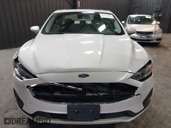 2020 Ford Fusion SE z VIN 3FA6P0LU8LR142370, wystawiony jako IAAI lot #42457342 z przebiegiem 53 808 mil mil oraz . Historia ofert i sprzedaży dostępna na DreamBid. Obrazek 6.