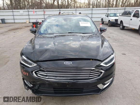 2017 Ford Fusion Titanium z VIN 3FA6P0K98HR200272, wystawiony jako IAAI lot #41905017 z przebiegiem 104 132 mil mil oraz . Historia ofert i sprzedaży dostępna na DreamBid. Obrazek 12.