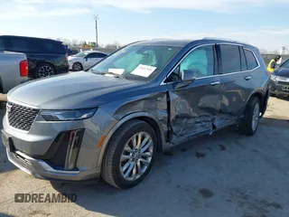 2020 Cadillac XT6 FWD Premium Luxury z VIN 1GYKPCRS8LZ129799, wystawiony jako IAAI lot #41602536 z przebiegiem 96 865 mil mil oraz . Historia ofert i sprzedaży dostępna na DreamBid. Obrazek 17.