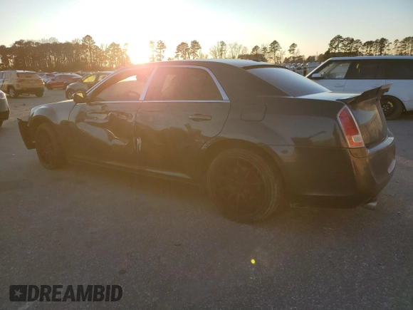2013 Chrysler 300 with VIN 2C3CCABT7DH612039, listed as a Copart auction lot 87598845 with 129,713 mi miles and Salvage Title. Bid and sale history available at carsss.com. Image 2.