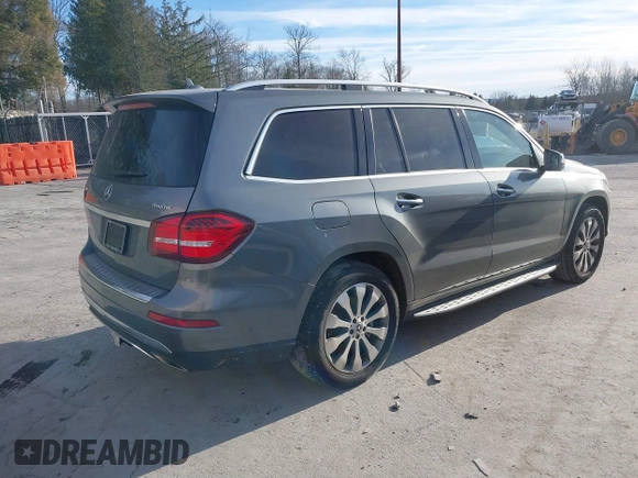 2018 Mercedes-Benz GLS with VIN 4JGDF6EE7JB098694, listed as a IAAI auction lot 41294697 with 104,807 mi miles. Bid and sale history available at carsss.com. Image 4.