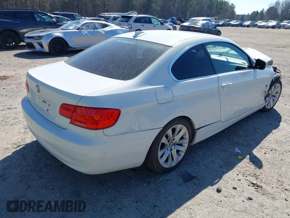 2011 BMW 3 Series 328i with VIN WBAKE3C58BE557891, listed as a IAAI auction lot 41717023 with 99,053 mi miles and . Bid and sale history available at carsss.com. Image 4.