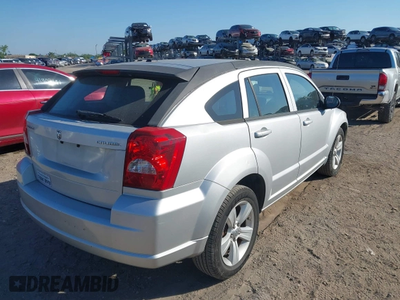 2011 Dodge Caliber Mainstreet with VIN 1B3CB3HA9BD126117, listed as a IAAI auction lot 41897907 with 85,026 mi miles and . Bid and sale history available at DreamBid. Image 4.