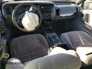 1998 Jeep Grand Cherokee Laredo with VIN 1J4GZ58S3WC245142, listed as a Copart auction lot 79434534 with 276,971 mi miles and Salvage Title. Bid and sale history available at carsss.com. Image 8.
