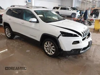 2015 Jeep Cherokee Limited with VIN 1C4PJMDS2FW682142, listed as a IAAI auction lot 41399903 with 124,918 mi miles and . Bid and sale history available at DreamBid. Image 1.
