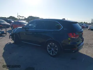 2018 BMW X5 xDrive40e iPerformance with VIN 5UXKT0C59J0W00801, listed as a IAAI auction lot 41081133 with 63,265 mi miles. Bid and sale history available at carsss.com. Image 3.