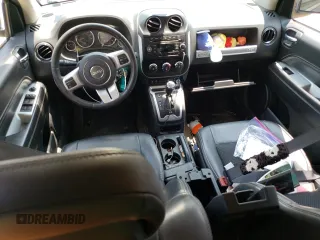 2016 Jeep Compass Latitude with VIN 1C4NJDEB4GD758009, listed as a Copart auction lot 60704745 with 143,393 mi miles and Salvage title. Bid and sale history available at DreamBid. Image 8.
