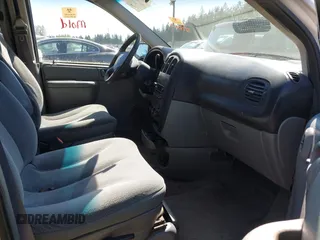 2005 Dodge Caravan SE with VIN 1D4GP25R55B298363, listed as a IAAI auction lot 42068006 with 306,997 mi miles. Bid and sale history available at carsss.com. Image 5.
