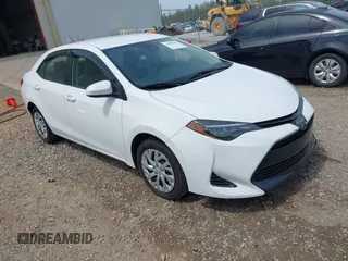 2019 Toyota Corolla L with VIN 5YFBURHE8KP949824, listed as a IAAI auction lot 41904385 with 112,054 mi miles. Bid and sale history available at carsss.com. Image 1.