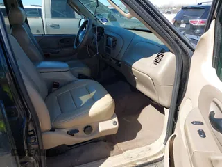 2003 Ford F-150 XLT with VIN 1FTRW07L83KC62296, listed as a IAAI auction lot 41689891 with 272,210 mi miles. Bid and sale history available at carsss.com. Image 5.