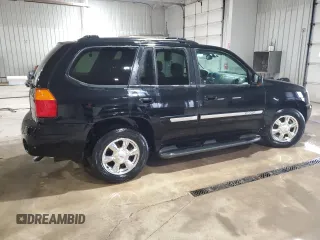 2003 GMC Envoy SLT with VIN 1GKDT13S232251871, listed as a Copart auction lot 45306785 with 174,303 mi miles and Salvage Title. Bid and sale history available at carsss.com. Image 3.