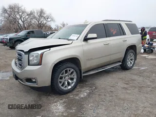 2015 GMC Yukon SLT z VIN 1GKS2BKC6FR655777, wystawiony jako IAAI lot #40982330 z przebiegiem 120 627 mil mil oraz . Historia ofert i sprzedaży dostępna na DreamBid. Obrazek 18.