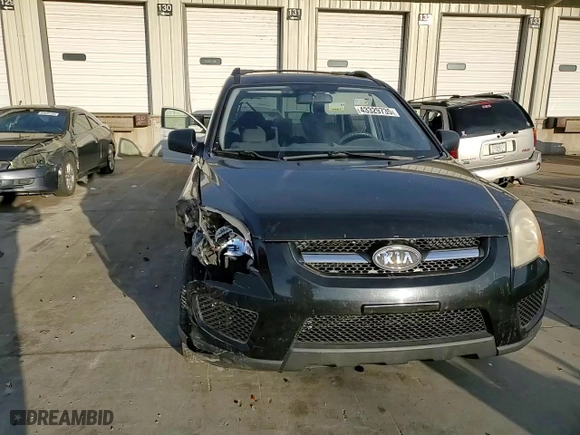 2009 Kia Sportage LX with VIN KNDJF724997571647, listed as a Copart auction lot 43329735 with 321,500 mi miles and Salvage Title. Bid and sale history available at carsss.com. Image 11.