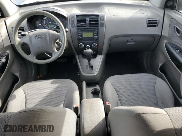 2009 Hyundai Tucson GLS with VIN KM8JM12B79U012399, listed as a Copart auction lot 77663414 with 164,615 mi miles and Salvage Title. Bid and sale history available at carsss.com. Image 8.