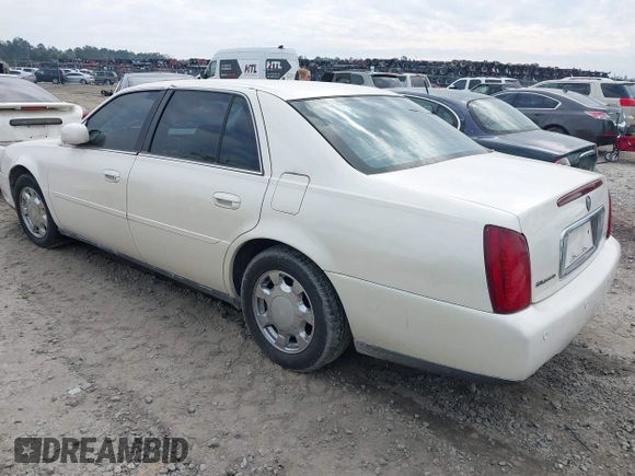 2000 Cadillac DeVille z VIN 1G6KD54Y2YU319515, wystawiony jako IAAI lot #41638065 z przebiegiem Nie podano mil oraz . Historia ofert i sprzedaży dostępna na DreamBid. Obrazek 3.