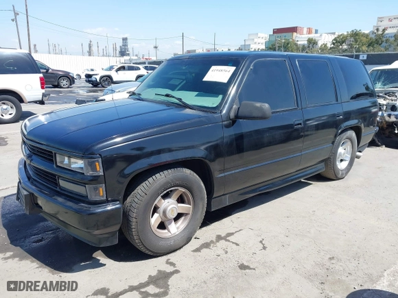 2000 Chevrolet Tahoe Limited with VIN 1GNEC13R7YR195106, listed as a IAAI auction lot 41948564 with 190,250 mi miles. Bid and sale history available at carsss.com. Image 2.