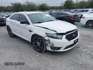 2016 Ford Taurus SHO z VIN 1FAHP2KT3GG138687, wystawiony jako IAAI lot #41576018 z przebiegiem 106 287 mil mil oraz . Historia ofert i sprzedaży dostępna na DreamBid. Obrazek 1.