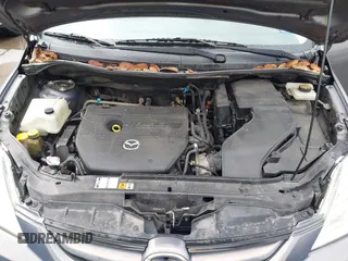 2010 Mazda 5 Sport z VIN JM1CR2W37A0387373, wystawiony jako IAAI lot #42356053 z przebiegiem 130 913 mil mil oraz . Historia ofert i sprzedaży dostępna na DreamBid. Obrazek 10.