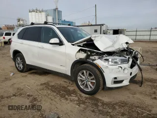 2014 BMW X5 xDrive35i with VIN 5UXKR0C56E0K48703, listed as a Copart auction lot 44233655 with 73,929 mi miles and Salvage Title. Bid and sale history available at carsss.com. Image 4.
