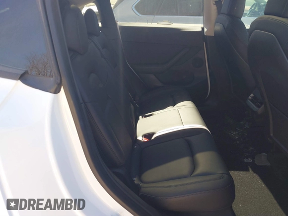 2021 Tesla Model Y Long Range with VIN 5YJYGDEE8MF125104, listed as a IAAI auction lot 41698065 with 25,177 mi miles and . Bid and sale history available at DreamBid. Image 8.