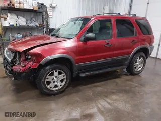 2003 Ford Escape XLT Popular 2 with VIN 1FMCU93173KA52806, listed as a IAAI auction lot 41696250 with 138,338 mi miles. Bid and sale history available at carsss.com. Image 18.