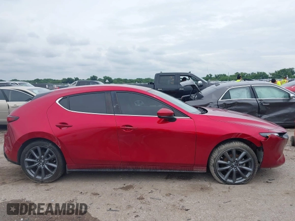 2019 Mazda 3 z VIN JM1BPAJM7K1133105, wystawiony jako IAAI lot #42473214 z przebiegiem 47 751 mil mil oraz . Historia ofert i sprzedaży dostępna na DreamBid. Obrazek 14.