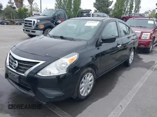 2016 Nissan Versa S Plus with VIN 3N1CN7AP7GL857242, listed as a IAAI auction lot 42135656 with 138,627 mi miles. Bid and sale history available at carsss.com. Image 6.