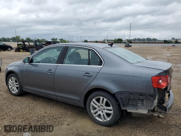 2007 Volkswagen Jetta 2.5 z VIN 3VWSF71K57M106657, wystawiony jako Copart lot #61479105 z przebiegiem 94 898 mil mil oraz Szkoda całkowita • Salvage title. Historia ofert i sprzedaży dostępna na DreamBid. Obrazek 2.