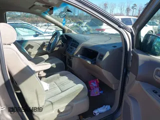 1999 Toyota Sienna LE with VIN 4T3ZF13CXXU121819, listed as a IAAI auction lot 41607624 with 999,999 mi miles. Bid and sale history available at carsss.com. Image 5.
