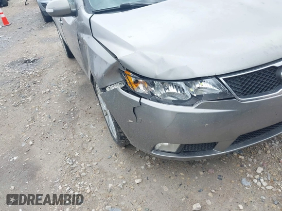 2010 Kia Forte SX with VIN KNAFW4A31A5048066, listed as a IAAI auction lot 42102810 with 160,998 mi miles. Bid and sale history available at carsss.com. Image 6.