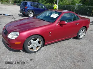 2000 Mercedes-Benz SLK 230 Kompressor with VIN WDBKK47F2YF146797, listed as a IAAI auction lot 42823113 with 35,881 mi miles and . Bid and sale history available at DreamBid. Image 2.