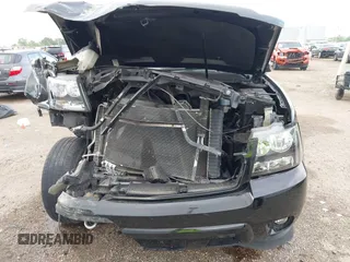 2009 Chevrolet Suburban LTZ with VIN 1GNFK36389J124653, listed as a IAAI auction lot 41935393 with 117,144 mi miles. Bid and sale history available at carsss.com. Image 6.