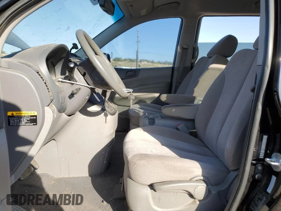 2010 Kia Sedona LX with VIN KNDMG4C31A6335678, listed as a Copart auction lot 76016514 with 130,889 mi miles and Salvage Title. Bid and sale history available at carsss.com. Image 7.