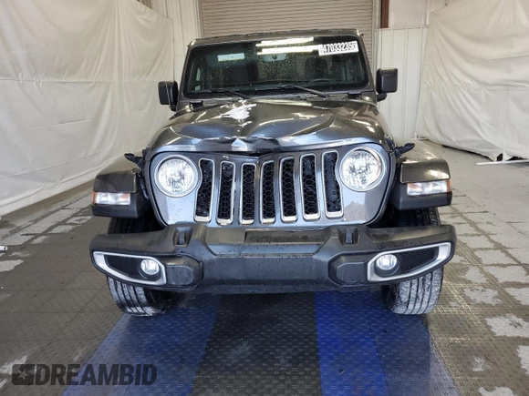 2023 Jeep Gladiator Overland z VIN 1C6HJTFGXPL560873, wystawiony jako Copart lot #47033235 z przebiegiem Nie podano mil oraz Czysty tytuł • Clean title. Historia ofert i sprzedaży dostępna na DreamBid. Obrazek 5.