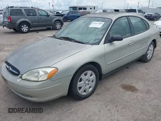 2003 Ford Taurus LX Standard z VIN 1FAFP52U43A149177, wystawiony jako IAAI lot #42227480 z przebiegiem 140 379 mil mil oraz . Historia ofert i sprzedaży dostępna na DreamBid. Obrazek 2.