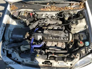 1995 Honda Civic DX z VIN 1HGEG8646SL023702, wystawiony jako Copart lot #82193694 z przebiegiem 213 950 mil mil oraz Szkoda całkowita • Salvage title. Historia ofert i sprzedaży dostępna na DreamBid. Obrazek 11.