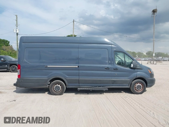 2019 Ford Transit z VIN 1FTYR3XM5KKB13744, wystawiony jako IAAI lot #41768047 z przebiegiem 106 212 mil mil oraz . Historia ofert i sprzedaży dostępna na DreamBid. Obrazek 13.