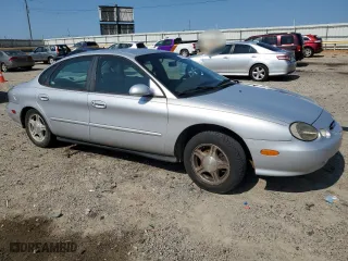 1999 Ford Taurus SE with VIN 1FAFP53U7XA202927, listed as a Copart auction lot 62508894 with 107,228 mi miles and Salvage Title. Bid and sale history available at carsss.com. Image 4.
