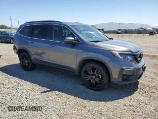 2021 Honda Pilot Special Edition with VIN 5FNYF6H28MB023432, listed as a Copart auction lot 55841035 with 61,203 mi miles and Salvage title. Bid and sale history available at DreamBid. Image 4.
