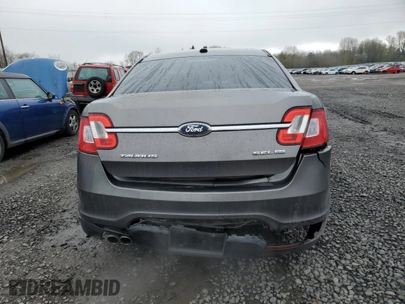 2012 Ford Taurus SEL z VIN 1FAHP2HW8CG124425, wystawiony jako Copart lot #50686415 z przebiegiem 172 480 mil mil oraz Szkoda całkowita • Salvage title. Historia ofert i sprzedaży dostępna na DreamBid. Obrazek 6.