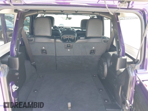 2023 Jeep Wrangler High Altitude z VIN 1C4HJXEN9PW560958, wystawiony jako IAAI lot #42393559 z przebiegiem 35 981 mil mil oraz . Historia ofert i sprzedaży dostępna na DreamBid. Obrazek 12.