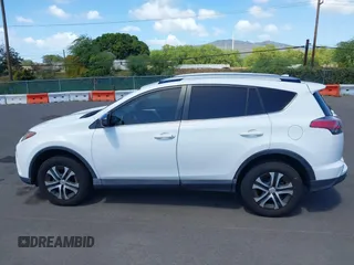 2017 Toyota RAV4 LE with VIN JTMZFREV2HJ721392, listed as a IAAI auction lot 41697170 with 59,357 mi miles and . Bid and sale history available at carsss.com. Image 14.