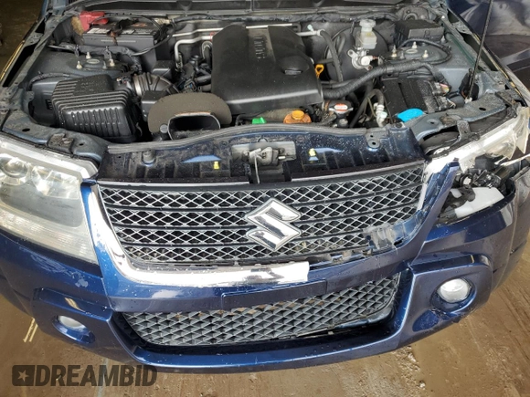 2012 Suzuki Grand Vitara Limited z VIN JS3TD0D77C4101382, wystawiony jako Copart lot #60017895 z przebiegiem 118 024 mil mil oraz Szkoda całkowita • Salvage title. Historia ofert i sprzedaży dostępna na DreamBid. Obrazek 12.