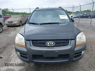 2007 Kia Sportage LX z VIN KNDJE723477366079, wystawiony jako IAAI lot #42358937 z przebiegiem 176 745 mil mil oraz . Historia ofert i sprzedaży dostępna na DreamBid. Obrazek 6.