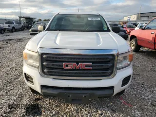 2015 GMC Canyon z VIN 1GTH6AE36F1135089, wystawiony jako Copart lot #78907294 z przebiegiem 411 431 mil mil oraz Czysty tytuł • Clean title. Historia ofert i sprzedaży dostępna na DreamBid. Obrazek 5.
