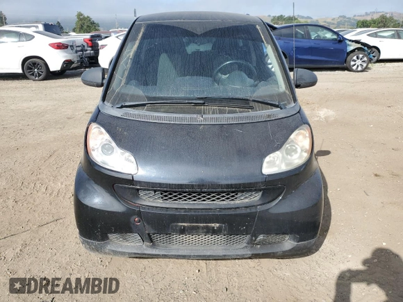 2014 Smart fortwo Pure z VIN WMEEJ3BA1EK753320, wystawiony jako Copart lot #55665555 z przebiegiem 71 305 mil mil oraz Szkody całkowita. Historia ofert i sprzedaży dostępna na DreamBid. Obrazek 5.