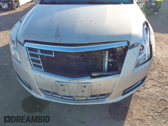 2014 Cadillac XTS with VIN 2G61L5S30E9207777, listed as a IAAI auction lot 41202654 with 112,565 mi miles. Bid and sale history available at carsss.com. Image 6.